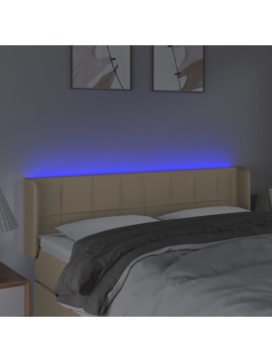 Čelo postele s LED krémové 147 x 16 x 78/88 cm textil