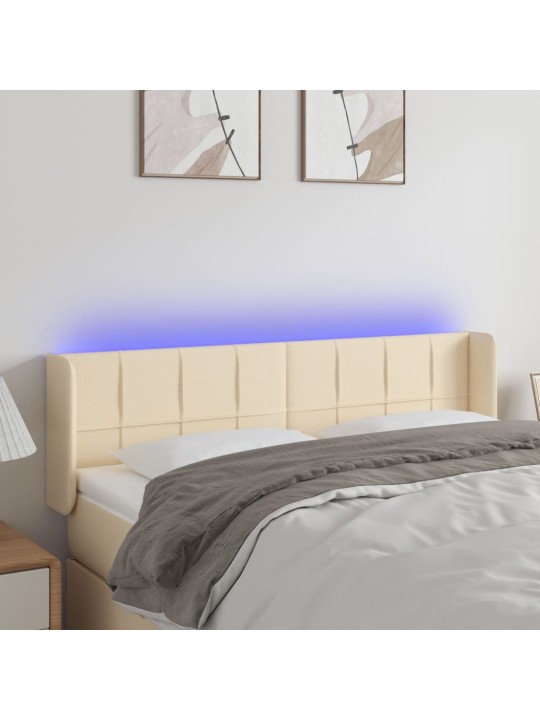 Čelo postele s LED krémové 147 x 16 x 78/88 cm textil
