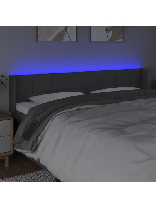 Čelo postele s LED tmavě šedé 183 x 16 x 78/88 cm textil