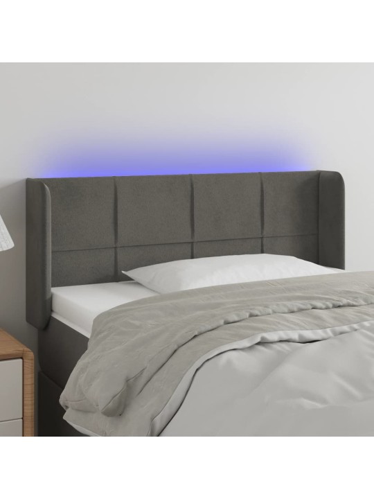 Čelo postele s LED tmavě šedé 103 x 16 x 78/88 cm samet