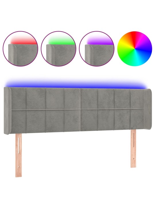 Čelo postele s LED světle šedé 147 x 16 x 78/88 cm samet
