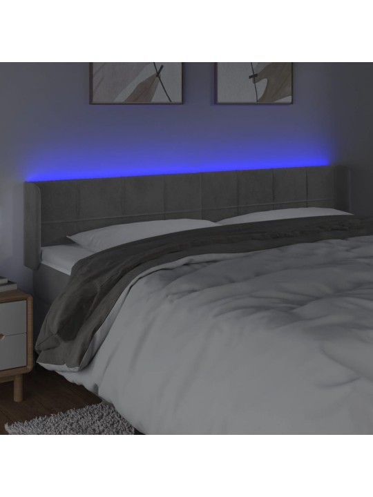 Čelo postele s LED světle šedé 183 x 16 x 78/88 cm samet