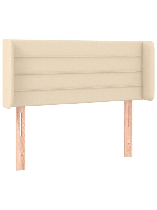 Čelo postele s LED krémové 83 x 16 x 78/88 cm textil