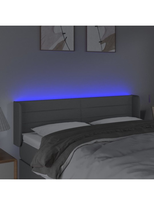 Čelo postele s LED světle šedé 147 x 16 x 78/88 cm textil