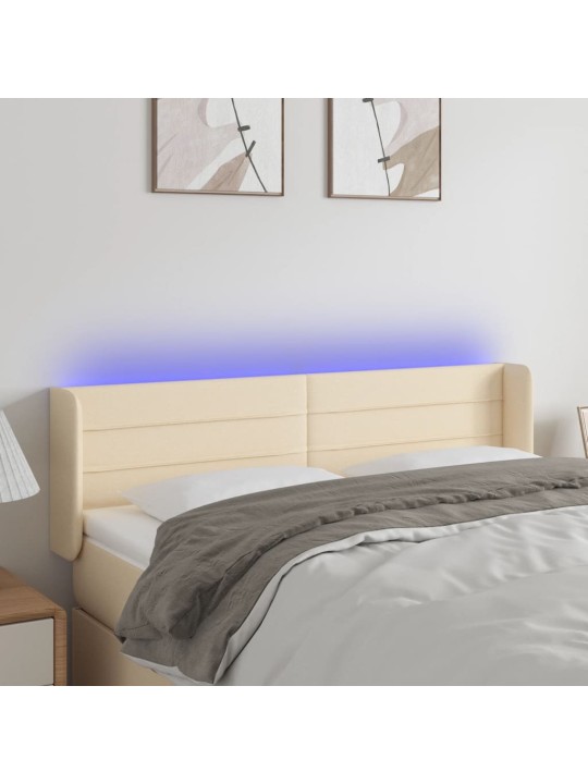Čelo postele s LED krémové 147 x 16 x 78/88 cm textil