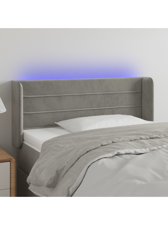 Čelo postele s LED světle šedé 83 x 16 x 78/88 cm samet