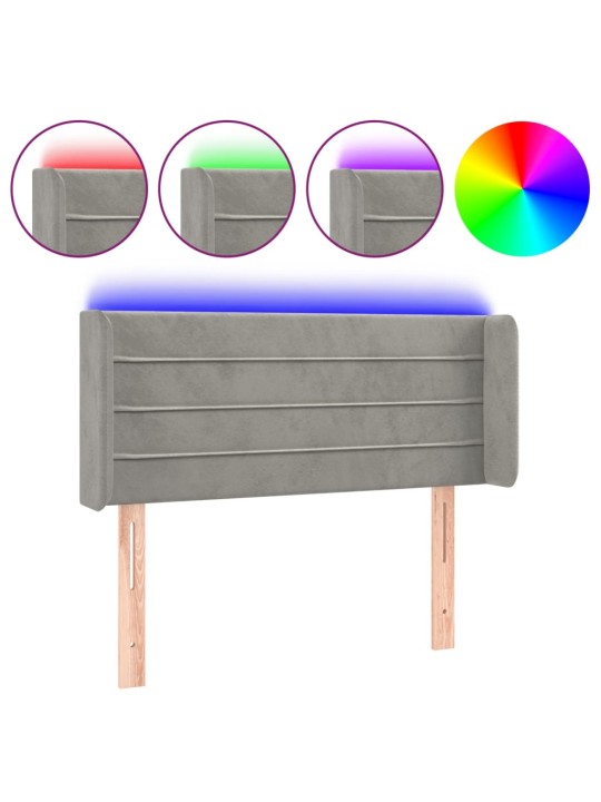 Čelo postele s LED světle šedé 103 x 16 x 78/88 cm samet