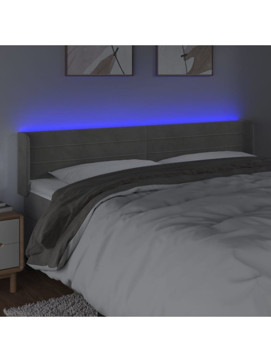 Čelo postele s LED světle šedé 183 x 16 x 78/88 cm samet