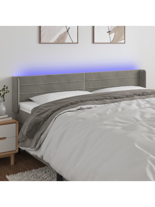 Čelo postele s LED světle šedé 183 x 16 x 78/88 cm samet