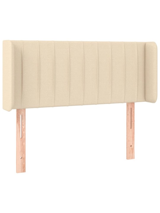 Čelo postele s LED krémové 83 x 16 x 78/88 cm textil