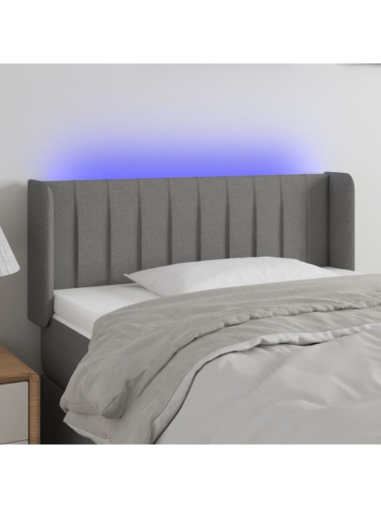 Čelo postele s LED tmavě šedé 103 x 16 x 78/88 cm textil