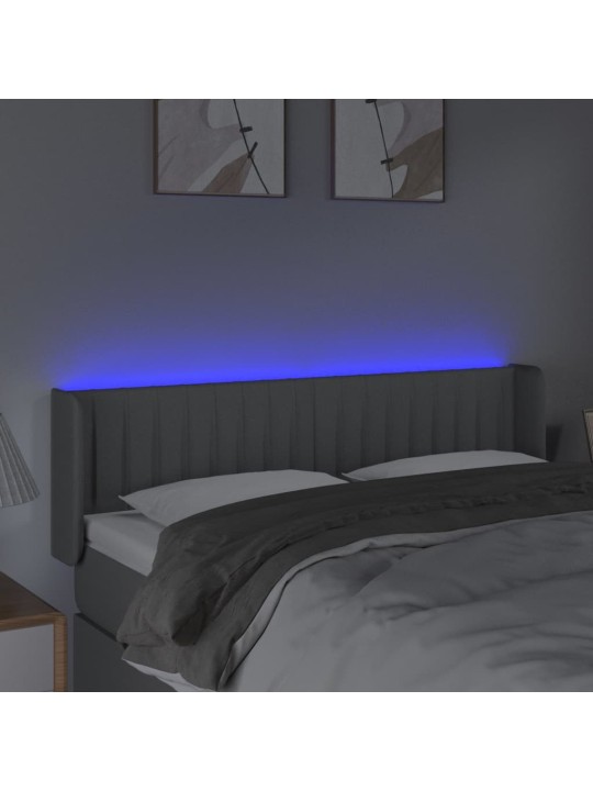 Čelo postele s LED světle šedé 147 x 16 x 78/88 cm textil
