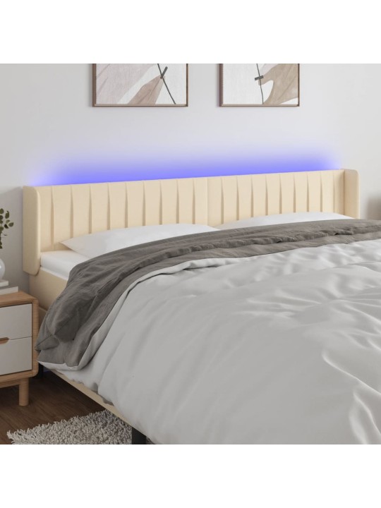 Čelo postele s LED krémové 183 x 16 x 78/88 cm textil