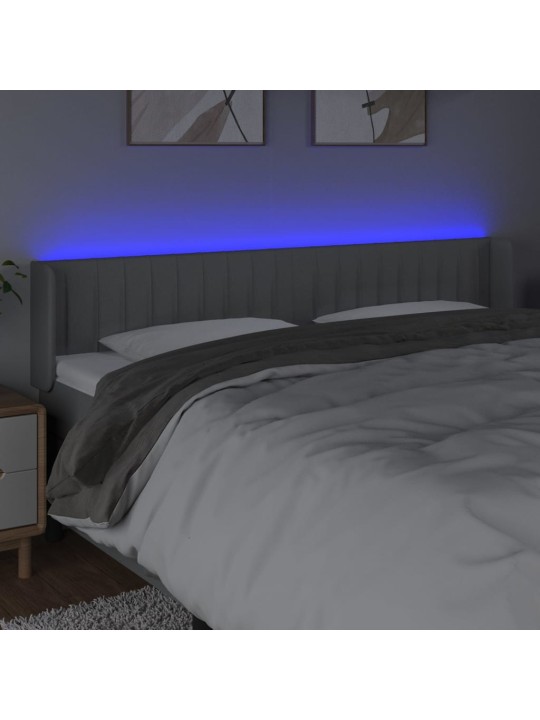Čelo postele s LED světle šedé 203 x 16 x 78/88 cm textil