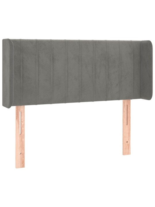 Čelo postele s LED světle šedé 83 x 16 x 78/88 cm samet
