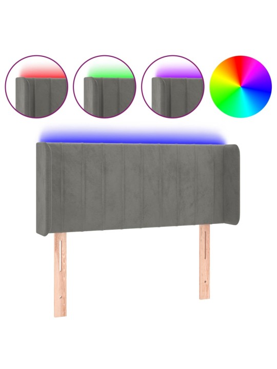 Čelo postele s LED světle šedé 103 x 16 x 78/88 cm samet