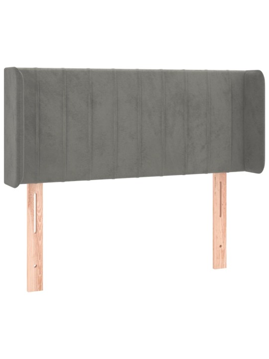 Čelo postele s LED světle šedé 103 x 16 x 78/88 cm samet