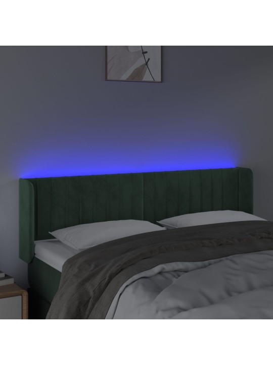 Čelo postele s led tmavě zelené 147 x 16 x 78/88 cm samet