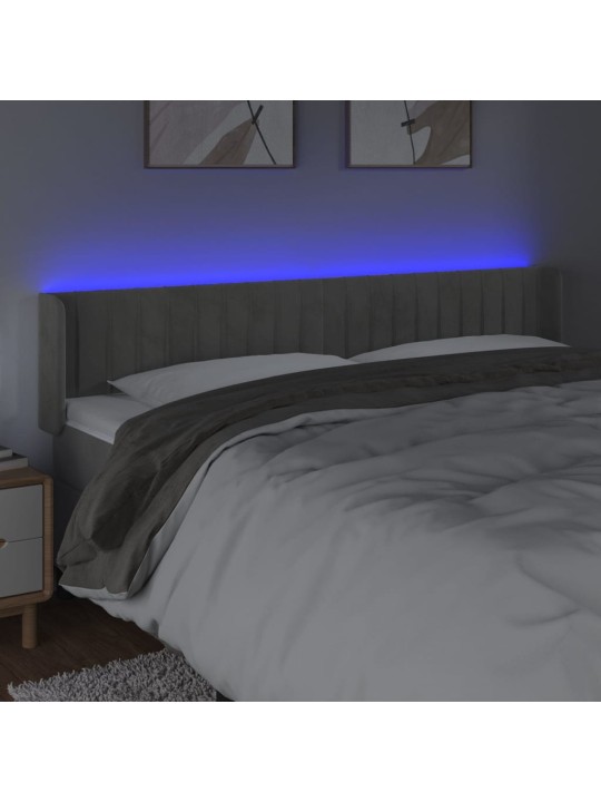 Čelo postele s LED světle šedé 203 x 16 x 78/88 cm samet