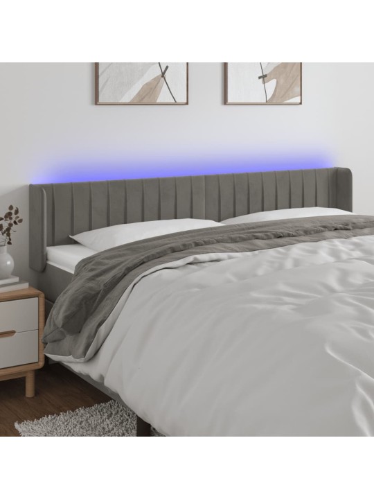 Čelo postele s LED světle šedé 203 x 16 x 78/88 cm samet