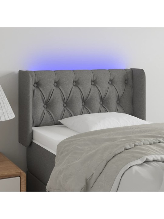 Čelo postele s LED tmavě šedé 83 x 16 x 78/88 cm textil