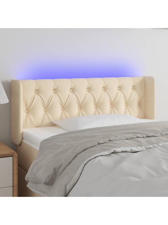Čelo postele s LED krémové 93 x 16 x 78/88 cm textil
