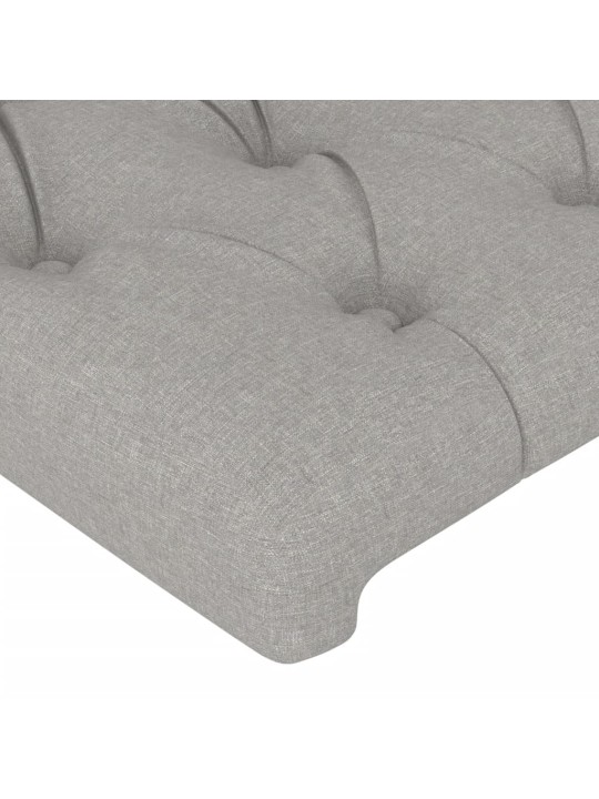Čelo postele s LED světle šedé 103 x 16 x 78/88 cm textil