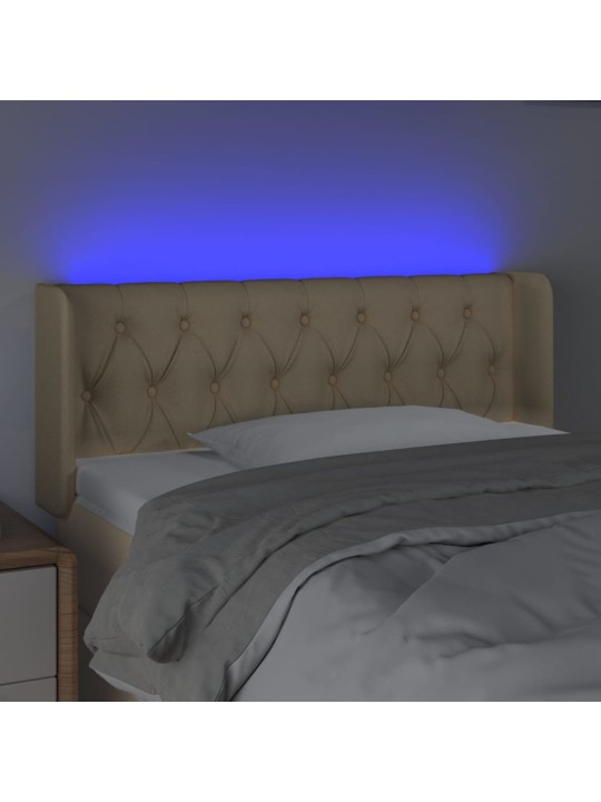Čelo postele s LED krémové 103 x 16 x 78/88 cm textil