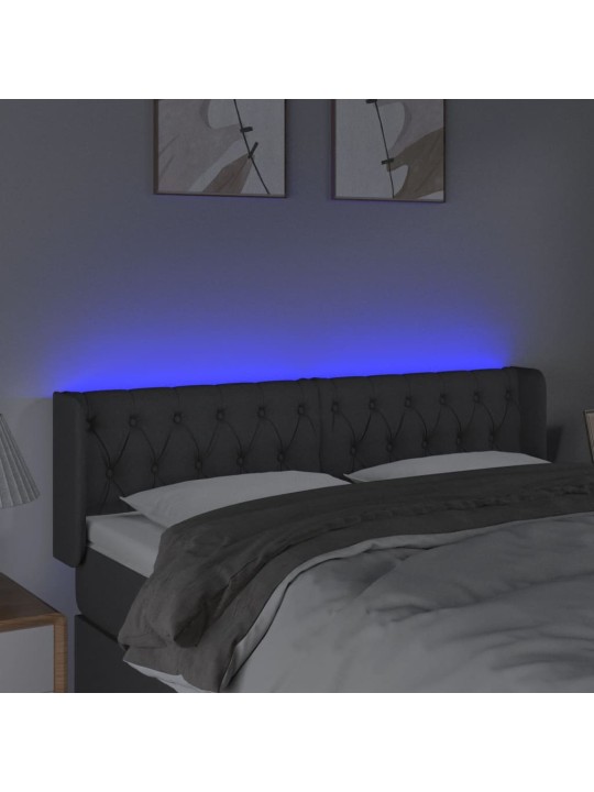 Čelo postele s LED tmavě šedé 147 x 16 x 78/88 cm textil