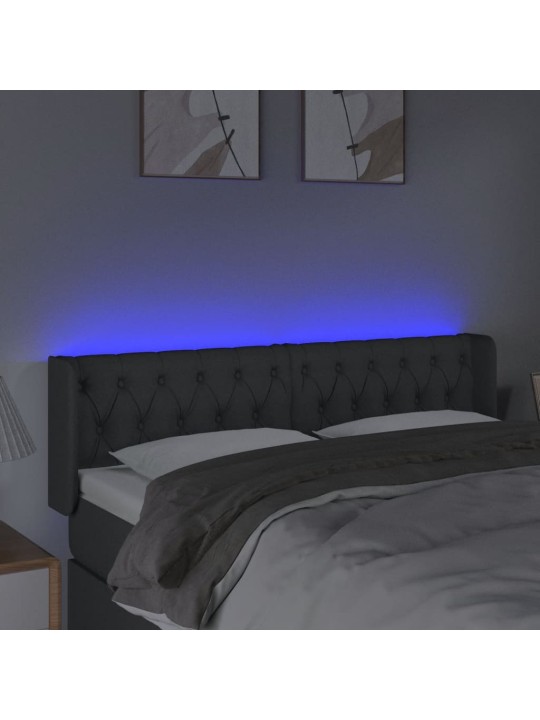 Čelo postele s LED tmavě šedé 163 x 16 x 78/88 cm textil