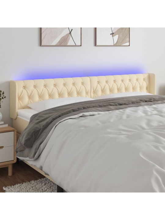 Čelo postele s LED krémové 183 x 16 x 78/88 cm textil