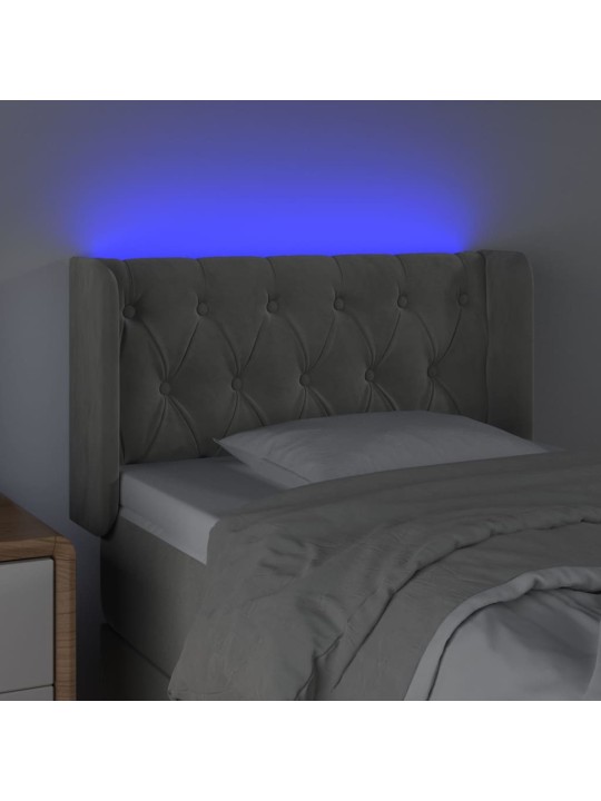 Čelo postele s LED světle šedé 83 x 16 x 78/88 cm samet