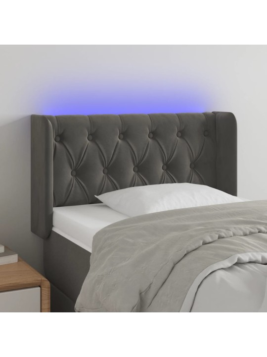 Čelo postele s LED tmavě šedé 83 x 16 x 78/88 cm samet