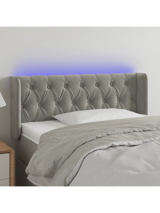Čelo postele s led světle šedé 103 x 16 x 78/88 cm samet