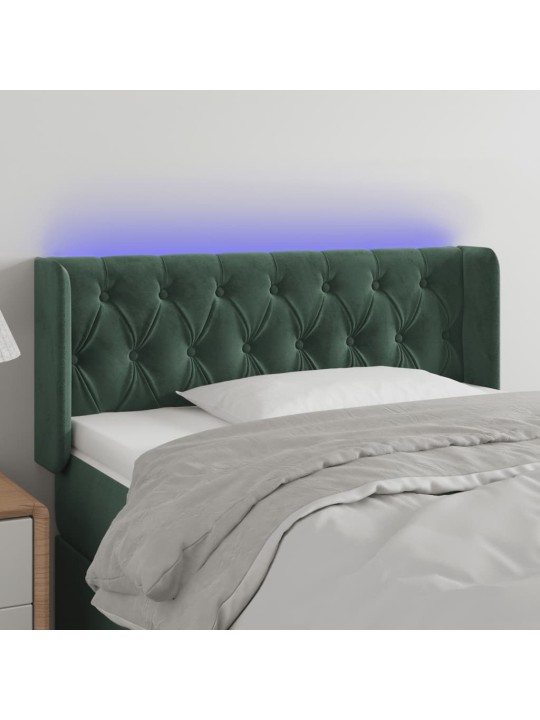 Čelo postele s led tmavě zelené 103 x 16 x 78/88 cm samet