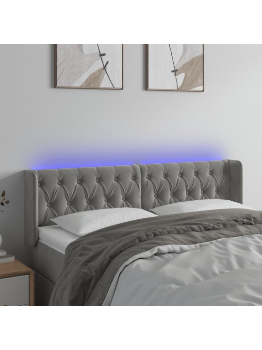 Čelo postele s led světle šedé 147 x 16 x 78/88 cm samet