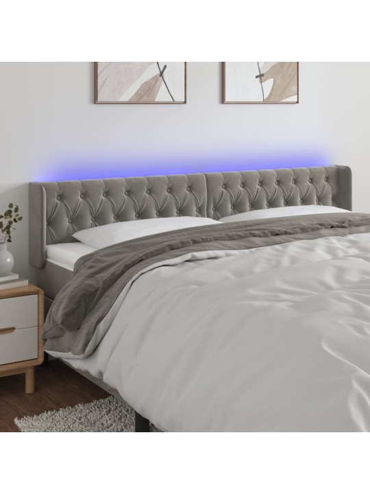 Čelo postele s LED světle šedé 183 x 16 x 78/88 cm samet