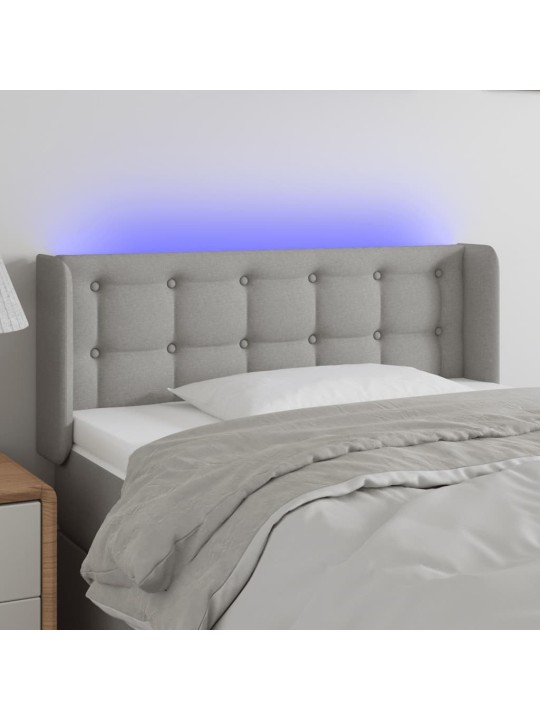 Čelo postele s LED světle šedé 83 x 16 x 78/88 cm textil