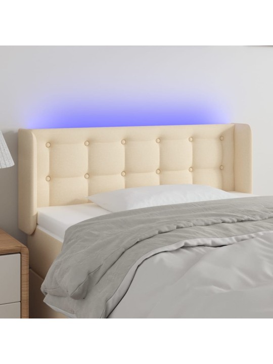 Čelo postele s LED krémové 93 x 16 x 78/88 cm textil