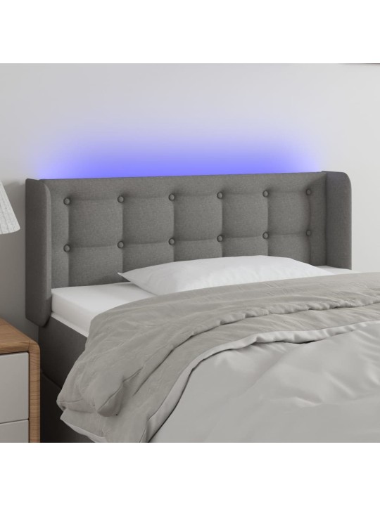 Čelo postele s LED tmavě šedé 103 x 16 x 78/88 cm textil