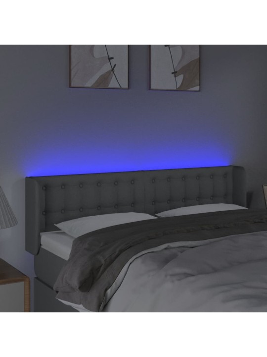 Čelo postele s LED světle šedé 147 x 16 x 78/88 cm textil
