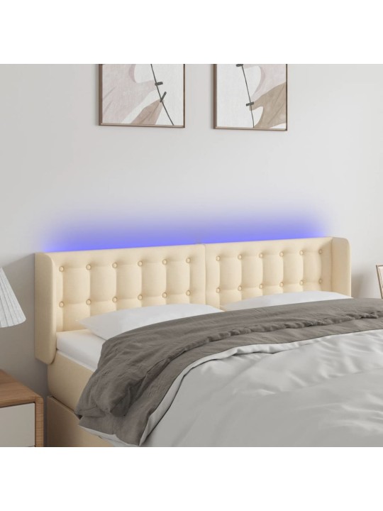 Čelo postele s LED krémové 147 x 16 x 78/88 cm textil