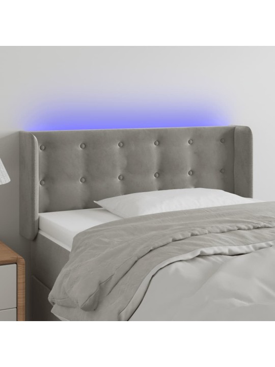 Čelo postele s LED světle šedé 93 x 16 x 78/88 cm samet