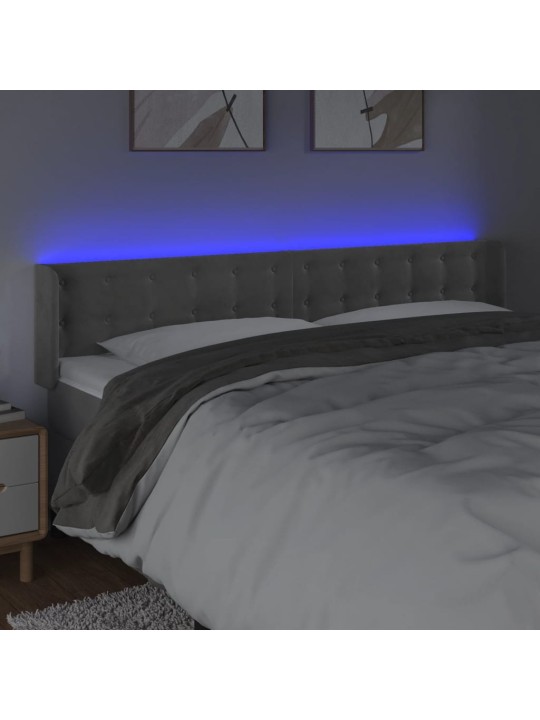 Čelo postele s LED světle šedé 183 x 16 x 78/88 cm samet