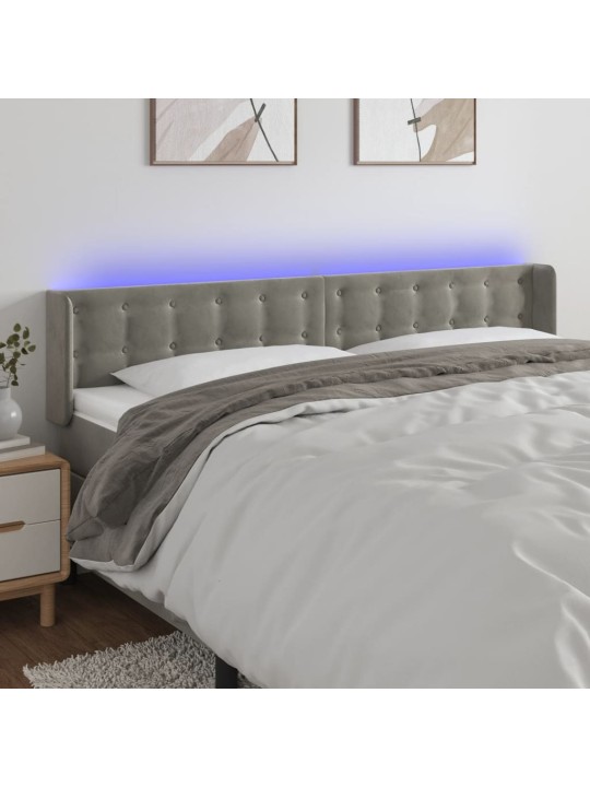 Čelo postele s LED světle šedé 183 x 16 x 78/88 cm samet