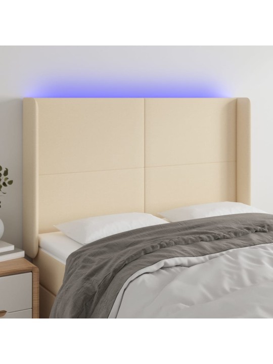 Čelo postele s led krémové 147 x 16 x 118/128 cm textil