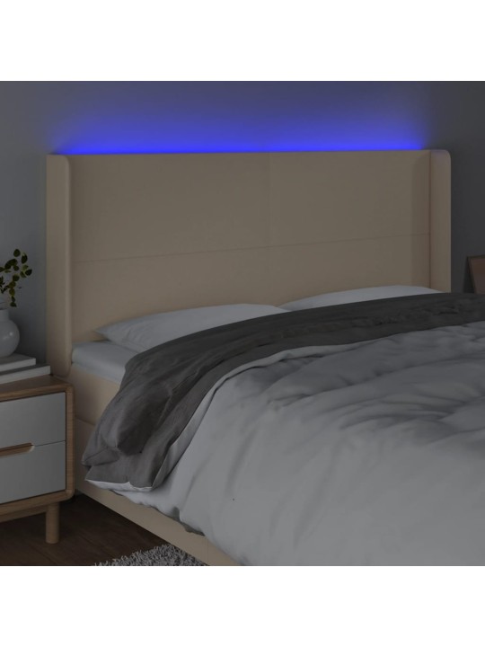 Čelo postele s led krémové 163 x 16 x 118/128 cm textil