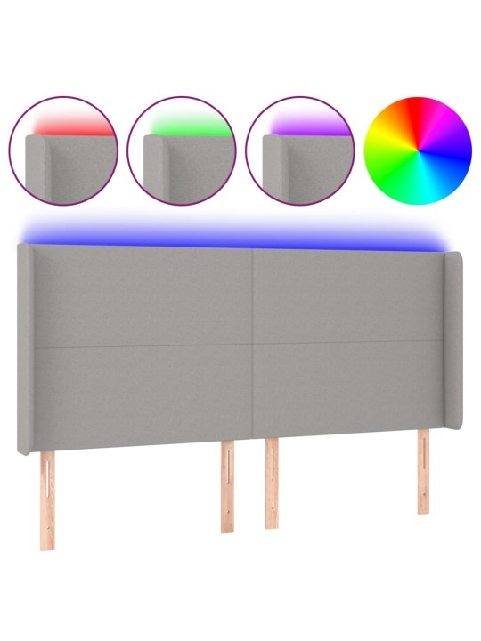 Čelo postele s LED světle šedé 183x16x118/128 cm textil