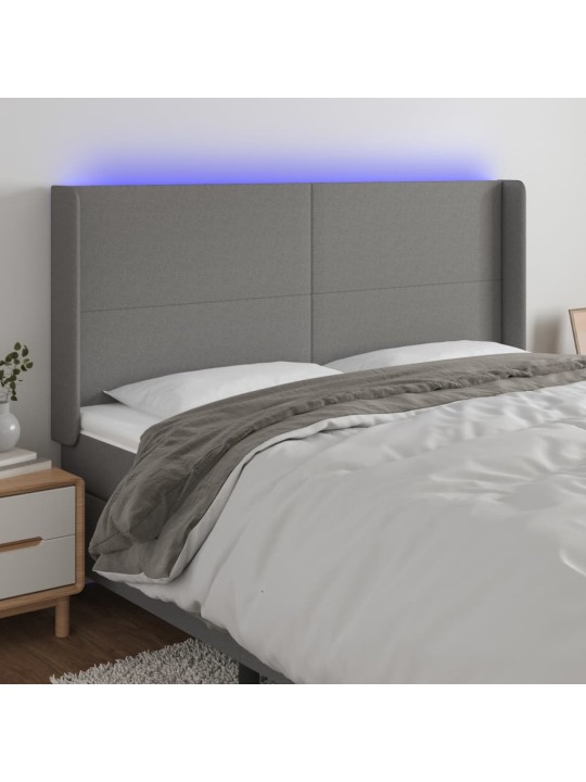 Čelo postele s LED tmavě šedé 183 x 16 x 118/128 cm textil