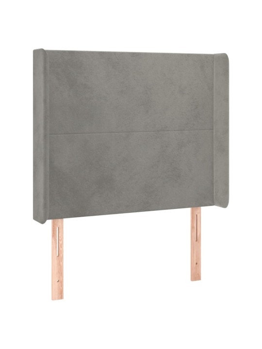 Čelo postele s LED světle šedé 83 x 16 x 118/128 cm samet